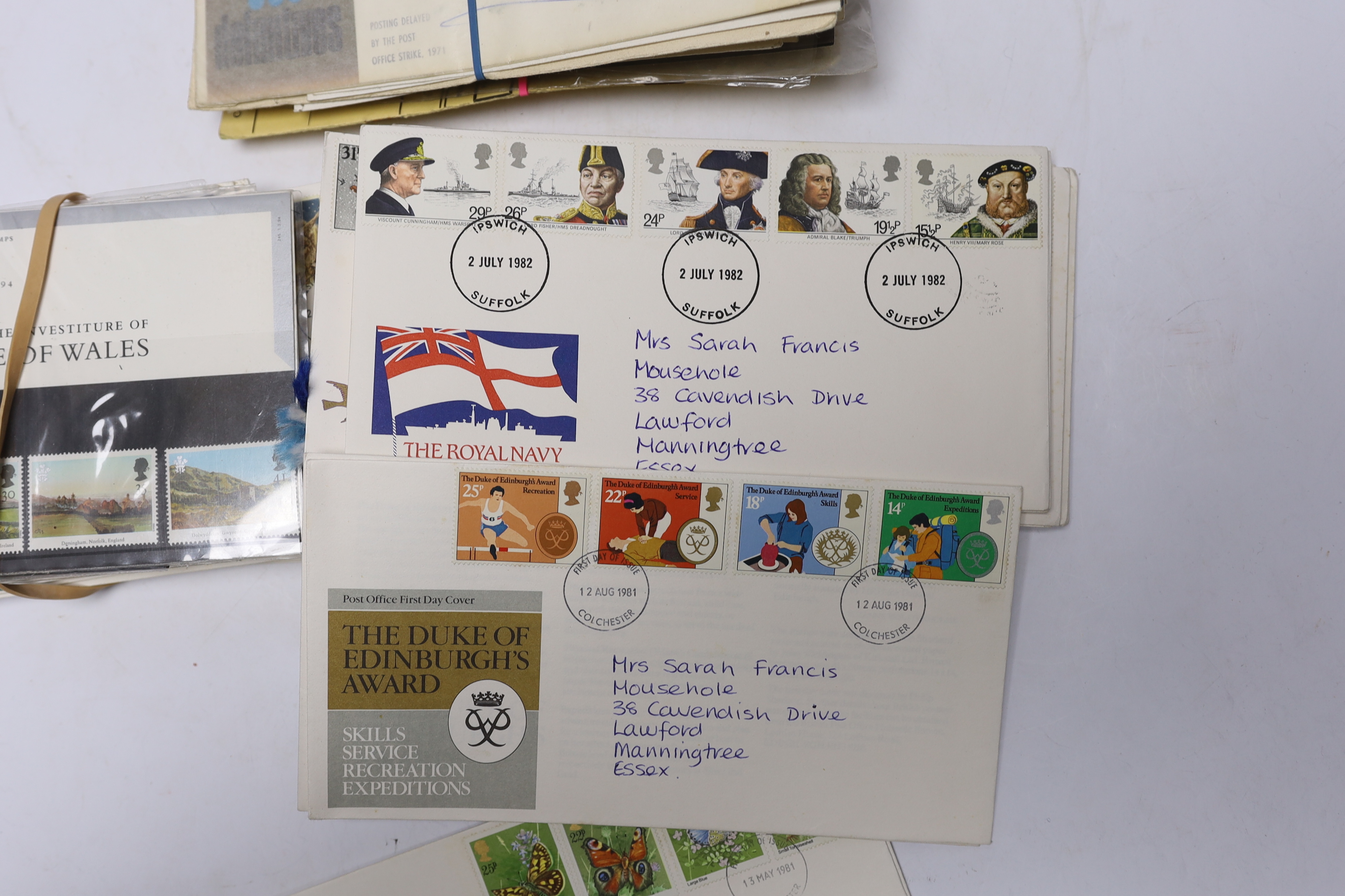 A collection of postage stamps and First Day covers